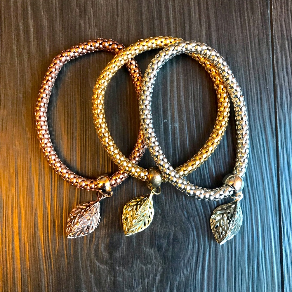 3/$12 Mixed Metal Bracelets With Jeweled Leaf Charm